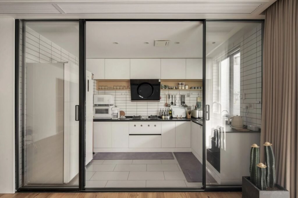 Modular Kitchen with Sliding Doors and Partitions