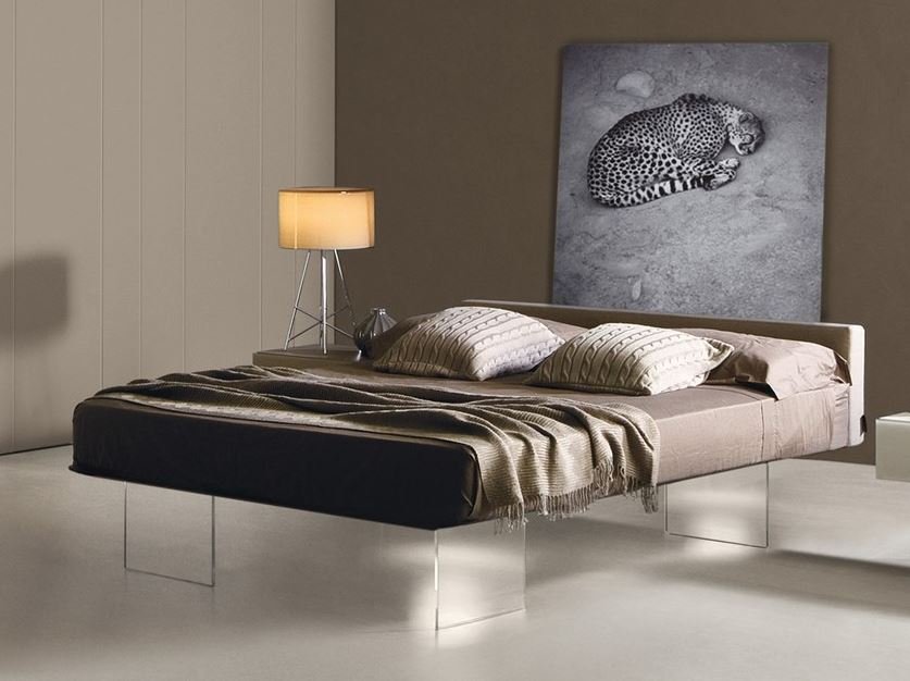 Contemporary platform floating bed with a minimalist wooden frame